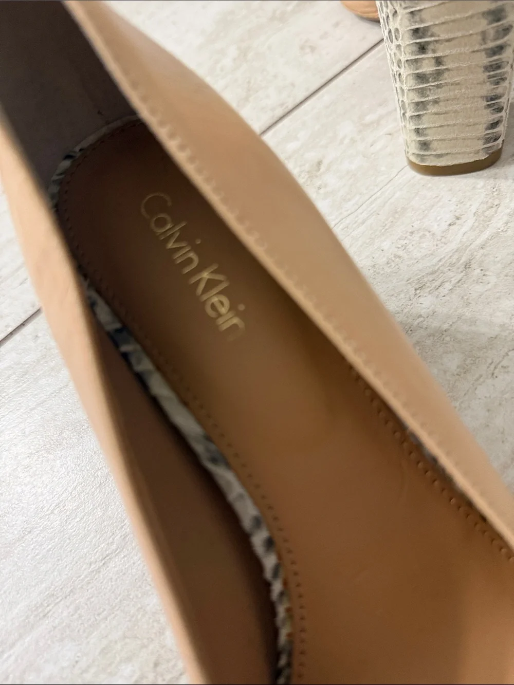 Calvin Klein sophisticated tan